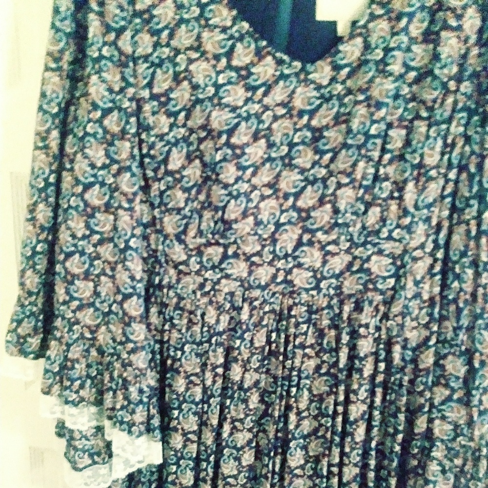 Long flair sleeved dress